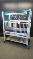 HARD INFANT CRIB