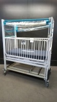 HARD INFANT CRIB