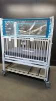 HARD INFANT CRIB