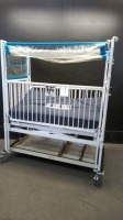 HARD INFANT CRIB