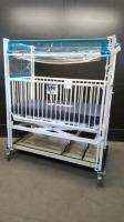 HARD INFANT CRIB