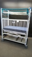 HARD INFANT CRIB