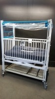 HARD INFANT CRIB