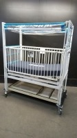 HARD INFANT CRIB