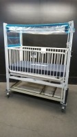 HARD INFANT CRIB