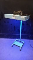 OLYMPIC MEDICAL 33 BILI-LITE ON ROLLING STAND