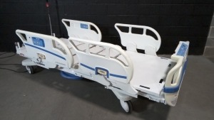 STRYKER 3002S3EX HOSPITAL BED W/SCALE,FOOTBOARD