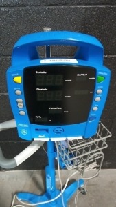 GE PROCARE AUSCULTATORY PATIENT MONITOR ON ROLLING STAND