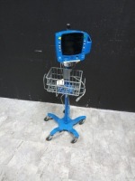 GE CARESCAPE V100 VITAL SIGN MONITOR ON ROLLING STAND