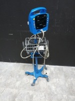 GE PROCARE VITAL SIGN MONITOR ON ROLLING STAND