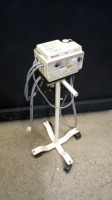 BAXTER T/PUMP ON ROLLING STAND