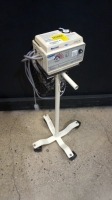 BAXTER T/PUMP ON ROLLING STAND