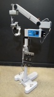 CARL ZEISS OPMI MDU SURGICAL MICROSCOPE TO INCLUDE SINGLE MOUNT BINOCULAR WITH EYEPIECES BOTH (10X/22B) BOTTOM LENSE (F 175) & MULTI-FUNCTION FOOTSWITCH ON STAND