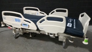 HILL-ROM CAREASSIST HOSPITAL BED W/SCALE & FOOTBOARD