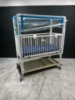 HARD INFANT CRIB