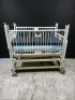 HARD INFANT CRIB