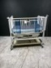 HARD INFANT CRIB