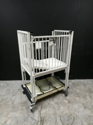 HARD INFANT CRIB