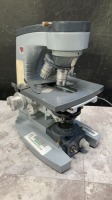 AO SPENCER LAB MICROSCOPE WITH 4 OBJECTIVES (4/.12, 10/.25, 40/.66, 100/1.25)