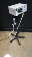 LUXTEC LX300 LIGHT SOURCE WITH HEADSET ON ROLLING STAND