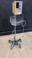 DATASCOPE ACCUTORR PLUS PATIENT MONITOR ON ROLLING STAND
