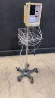 DATASCOPE ACCUTORR PLUS PATIENT MONITOR ON ROLLING STAND