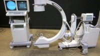 GE SERIES 9800 C-ARM SYSTEM WITH 9 INCH II TO INCLUDE DUAL MONTIOR WORKSTATION WITH HAND CONTROL & FOOTSWITCH (SERIAL# 89-1378) (DOM: 3/2002)