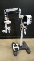 WILD HEERBRUGG M690 SURGICAL MICROSCOPE TO INCLUDE SINGLE MOUNT BINOCULAR WITH EYEPIECES BOTH (10X/21) BOTTOM LENSE (F=200MM) & FOOTSWITCH ON STAND