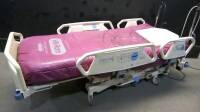 HILL-ROM P1900 TOTALCARE SPORT HOSPITAL BED WITH CPR AND FOOT BOARD AND MODULE (ROTATION)