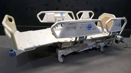 HILL-ROM P1900 TOTALCARE HOSPITAL BED WITH CPR AND FOOT BOARD