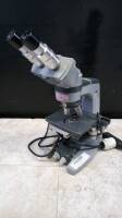 AO SPENCER LAB MICROSCOPE WITH 2 EYEPIECES (10X W.F.) AND 4 OBJECTIVES (4, 10, 40, 100)