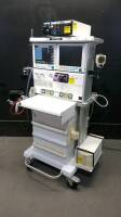 DATEX-OHMEDA ADU CARESTATION ANESTHESIA MACHINE (VER. M1004742-8.0) WITH MODULE RACK (M-CAIOV, M-NESTPR, M-COP, M-REC) AND ALADIN 2 ISOFLURANE VAPORIZER