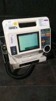 MEDTRONIC LIFEPAK 12 DEFIB WITH ECG,PACING,ANALYZE,BATTERIES,NIBP,SPO2,PADDLES