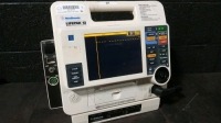 MEDTRONIC LIFEPAK 12 DEFIB WITH ECG,PACING,ANALYZE,BATTERIES,NIBP,SPO2,CO2,PADDLES