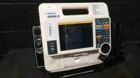 MEDTRONIC LIFEPAK 12 DEFIB WITH ECG,PACING,ANALYZE,BATTERIES,PADDLES,NIBP,SPO2,CO2