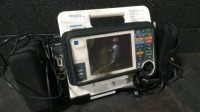 MEDTRONIC LIFEPAK 12 DEFIB WITH ECG,PACING,ANALYZE,BATTERIES,PADDLES,NIBP,SPO2