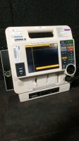 MEDTRONIC LIFEPAK 12 DEFIB WITH ECG,PACING,ANALYZE,BATTERIES,PADDLES