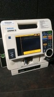 MEDTRONIC LIFEPAK 12 DEFIB WITH ECG,PACING,ANALYZE,BATTERIES,PADDLES