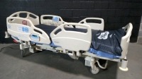 HILL-ROM CAREASSIST HOSPITAL BED W/SCALE,HEAD & FOOTBOARDS