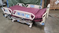 HILL-ROM TOTALCARE P1900 HOSPITAL BED WITH SCALE & FOOTBOARD