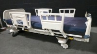 STRYKER SECURE 3002 HOSPITAL BED W/SCALE,HEAD & FOOTBOARDS