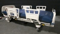 STRYKER SECURE 3002 HOSPITAL BED W/SCALE,HEAD & FOOTBOARDS