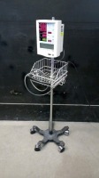 DATASCOPE ACCUTORR PLUS PATIENT MONITOR ON ROLLING STAND