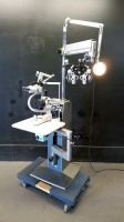 OPHTHALMIC STAND TO INCLUDE: ZEISS 165604 SLIT LAMP, HAAG-STREIT BERN 87025231 TONOMETER, REICHERT 11635 PHOROPTER, ON RELIANCE 7700 STAND