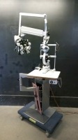 OPHTHALMIC STAND TO INCLUDE: ZEISS 159974 SLIT LAMP, HAAG-STREIT BERN 87023193 TONOMETER, AO 11635 PHOROPTER, ON RELIANCE 7700 STAND