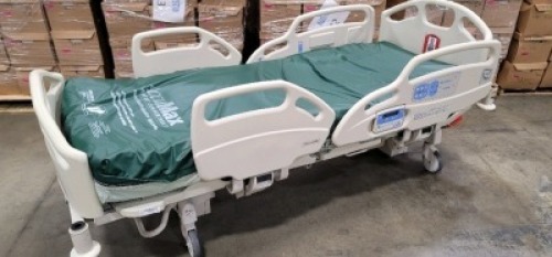 HILL-ROM CAREASSIST HOSPITAL BED W/SCALE,HEAD & FOOTBOARDS located at 902 nicholson road suite 200 Garland, TX 75042