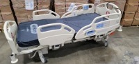 HILL-ROM CAREASSIST HOSPITAL BED W/SCALE,HEAD & FOOTBOARDS located at 902 nicholson road suite 200 Garland, TX 75042