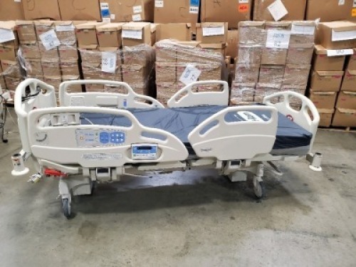 HILL-ROM CAREASSIST HOSPITAL BED W/SCALE,HEAD & FOOTBOARDS located at 902 nicholson road suite 200 Garland, TX 75042