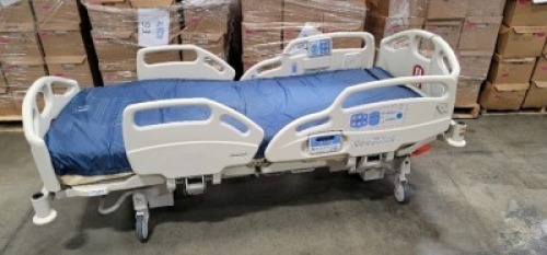 HILL-ROM CAREASSIST HOSPITAL BED W/SCALE,HEAD & FOOTBOARDS located at 902 nicholson road suite 200 Garland, TX 75042