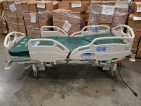 HILL-ROM CAREASSIST HOSPITAL BED W/SCALE,HEAD & FOOTBOARDS located at 902 nicholson road suite 200 Garland, TX 75042